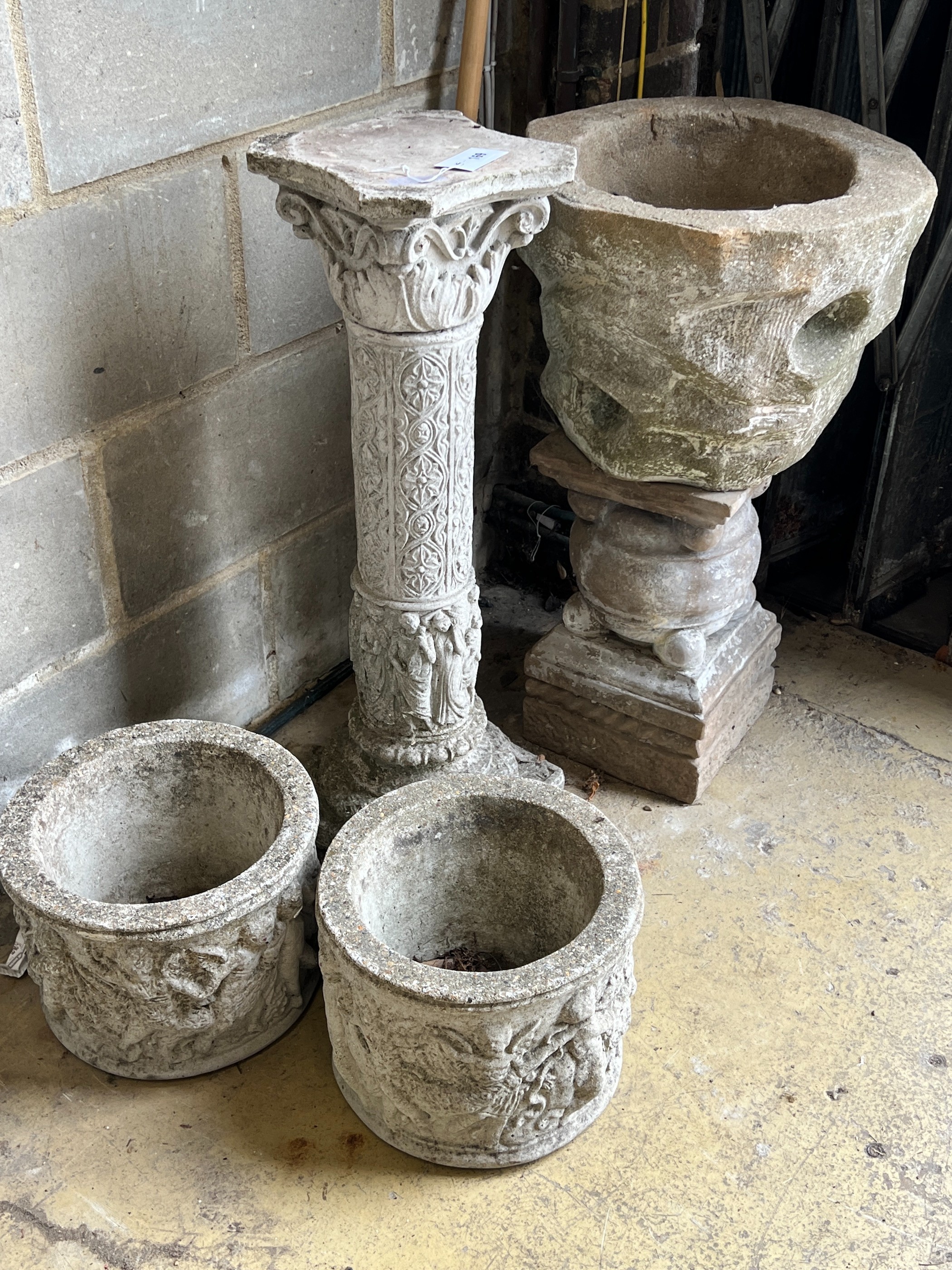 A garden planter on associated plinth, a garden column and two circular garden planters